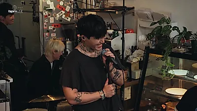 Jhnovr showcases musicality through a band live performance with a full instrumental composition